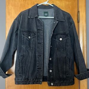 Dark grey/black oversized denim jacket.